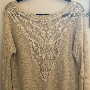 Beautiful knitted sweater with floral open back!